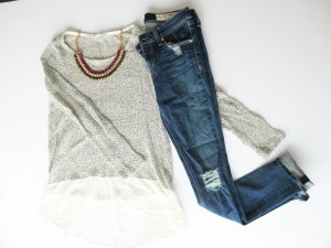 ripped jeans and knit sweater with ruffle