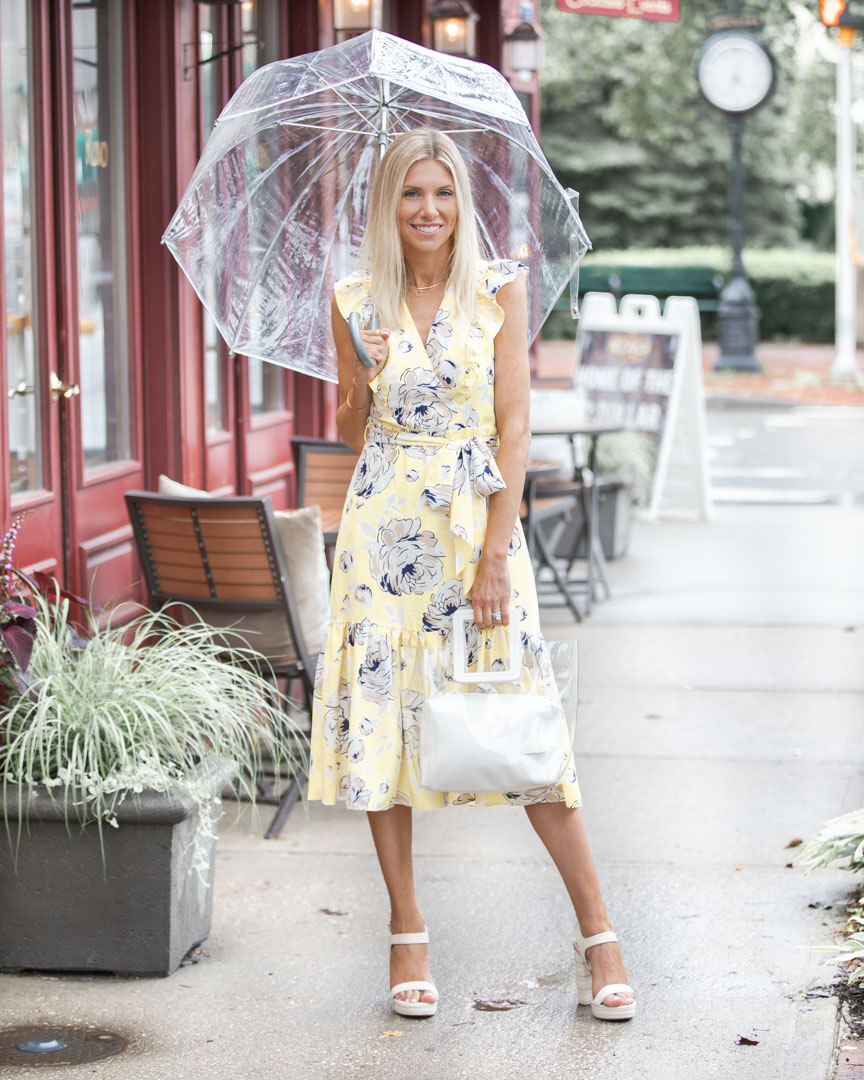 yellow wrap dress with white accessories