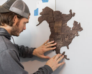 enjoy-the-wood-world-map-affixing-to-wall-the-glamorous-gal